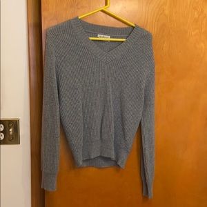 Grey sweater with hints of color